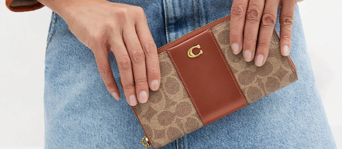 Coach Wallet Real vs. Fake Guide 2026: 9 Signs to Spot a Fake One